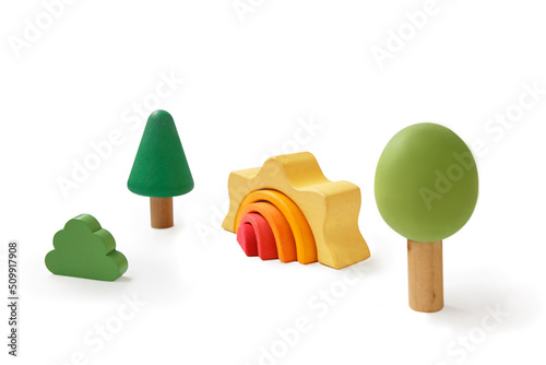 Sun and trees from a wooden constructor.