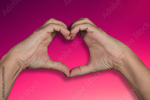 Valentine   s day background with hand making heart shape