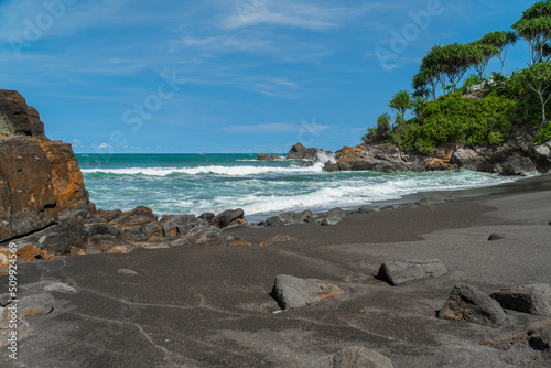 Natural view of the coast in Indonesia when the weather is sunny. Karang Tawulan beach tourism in Indonesia photo