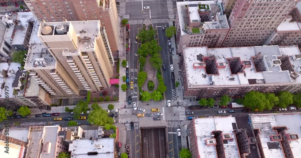 Various kinds of buildings in the district of New York. Busy streets with many cars going along. Aerial perspective. Various kinds of buildings in the district of New York. Busy streets with many cars going along. Aerial perspective.