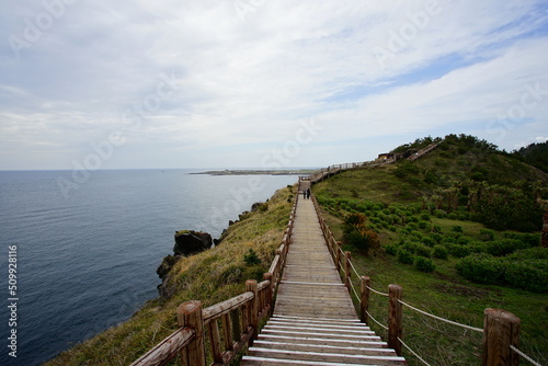seaside cliff walkway and people