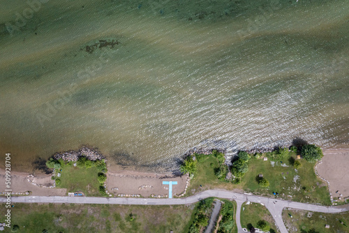 Innisfil  beach views with green water   patterns looking Down photo