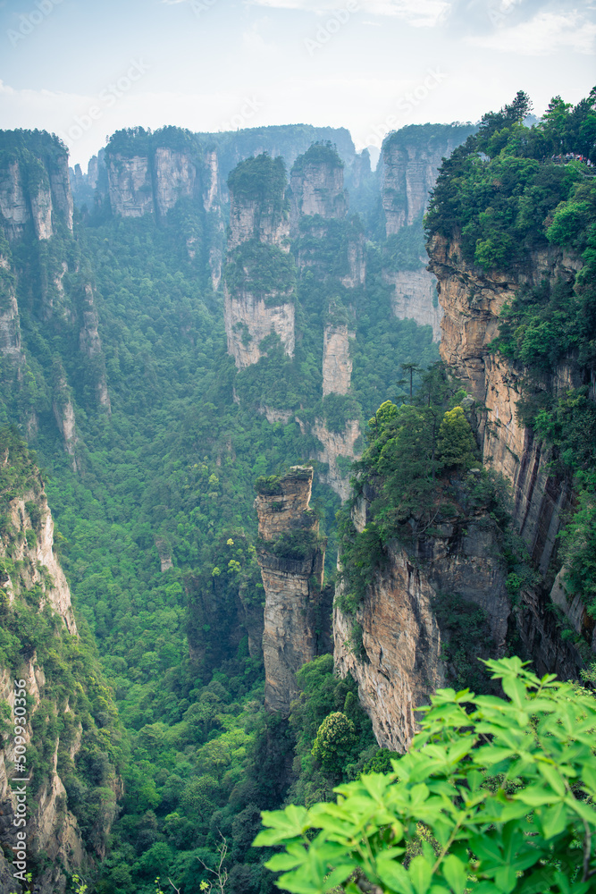 Vertical images of the flying limestone mountains of Wulingyuan National forest park in Zhangjiajie, Hunan, China. An inspiration for the Avatar movie Vertical images of the flying limestone mountains of Wulingyuan National forest park in Zhangjiajie, Hunan, China. An inspiration for the Avatar movie