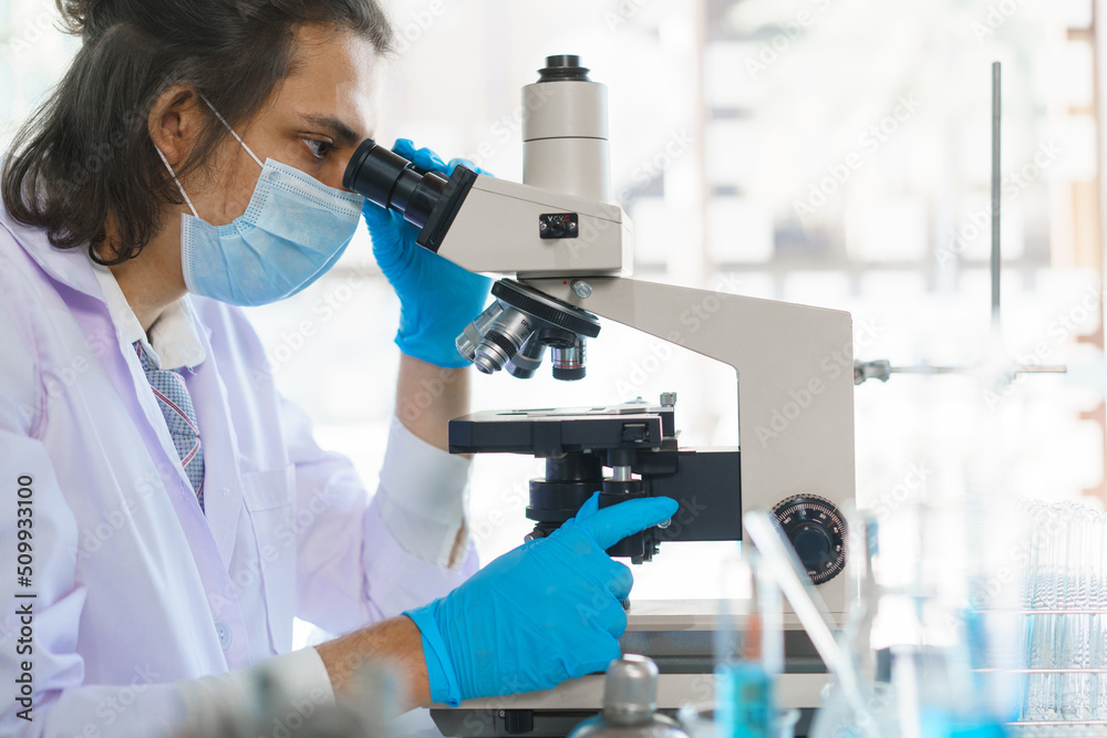 Laboratory research concept, Scientist working in lab with microscope to research drug and vaccine Laboratory research concept, Scientist working in lab with microscope to research drug and vaccine