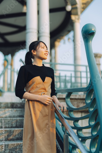 愛知県名古屋市の鶴舞公園を散歩している若い女性 Young woman walking in Tsurumai Park, Nagoya, Aichi, Japan. photo