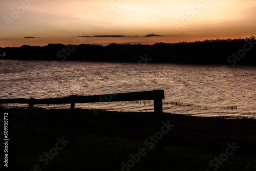 view of sunset in the Jurumirim lake dam water reservoir in Avare, state of Sao Paulo © AlfRibeiro