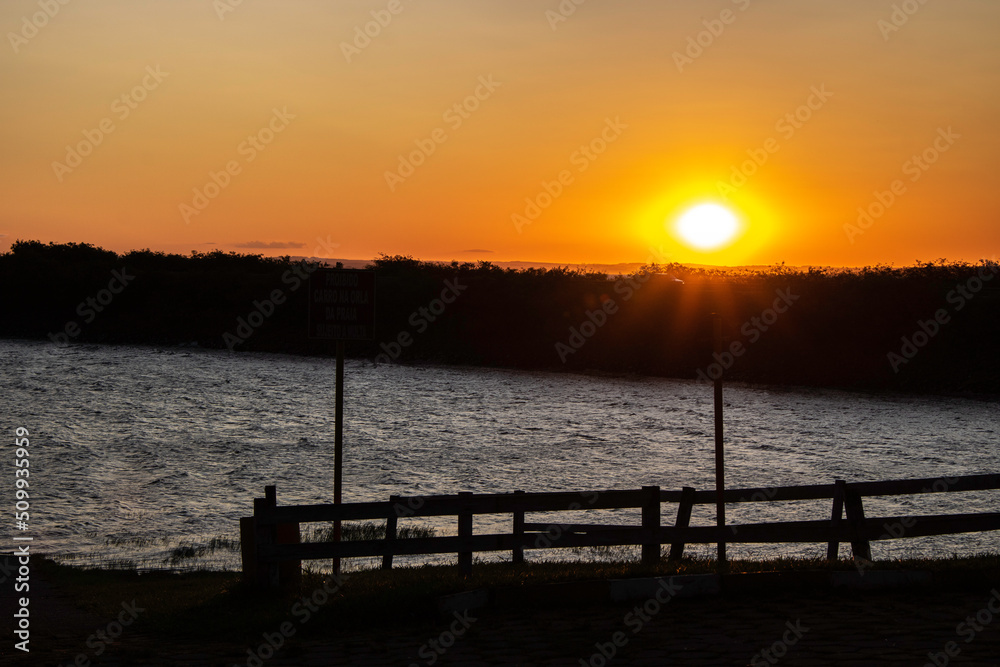 view of sunset in the Jurumirim lake dam water reservoir in Avare, state of Sao Paulo