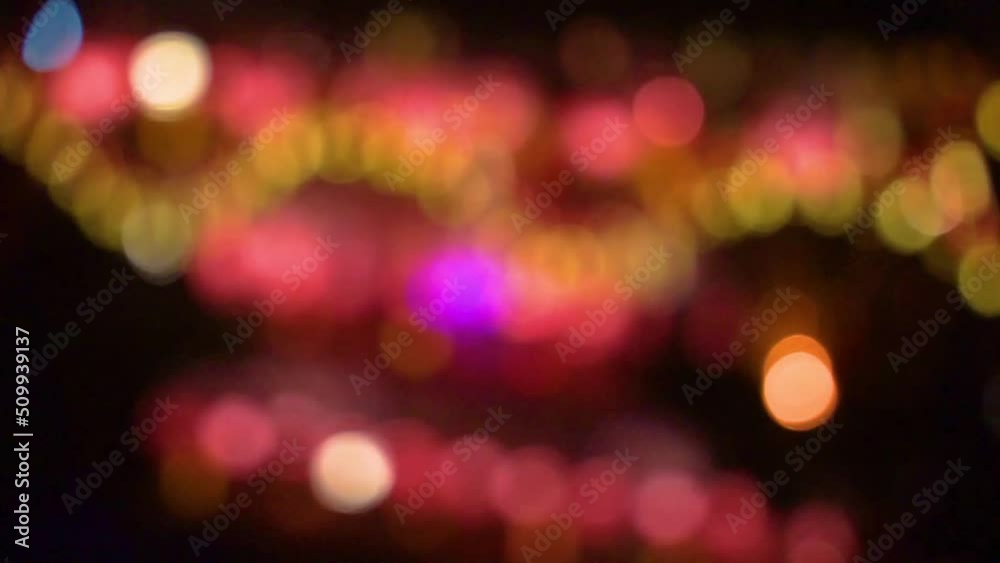 Bokeh of lanterns refection with the river blurred. Beautiful nature and festivals. Blurred background Bokeh of lanterns refection with the river blurred. Beautiful nature and festivals. Blurred background