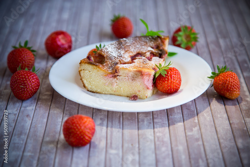Sweet cottage cheese casserole with strawberry filling