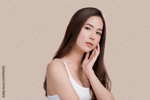 Beautiful Asian woman touching soft cheek smile with clean and fresh skin Happiness ,isolated on white background, Beauty Cosmetics and spa Treatment Concept.