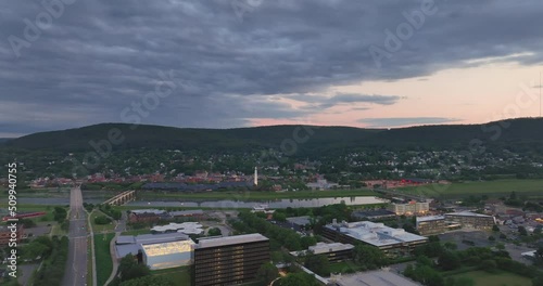 Early evening spring, summer aerial video of area around Corning New York photo