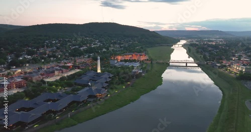 Early evening spring, summer aerial video of area around Corning New York