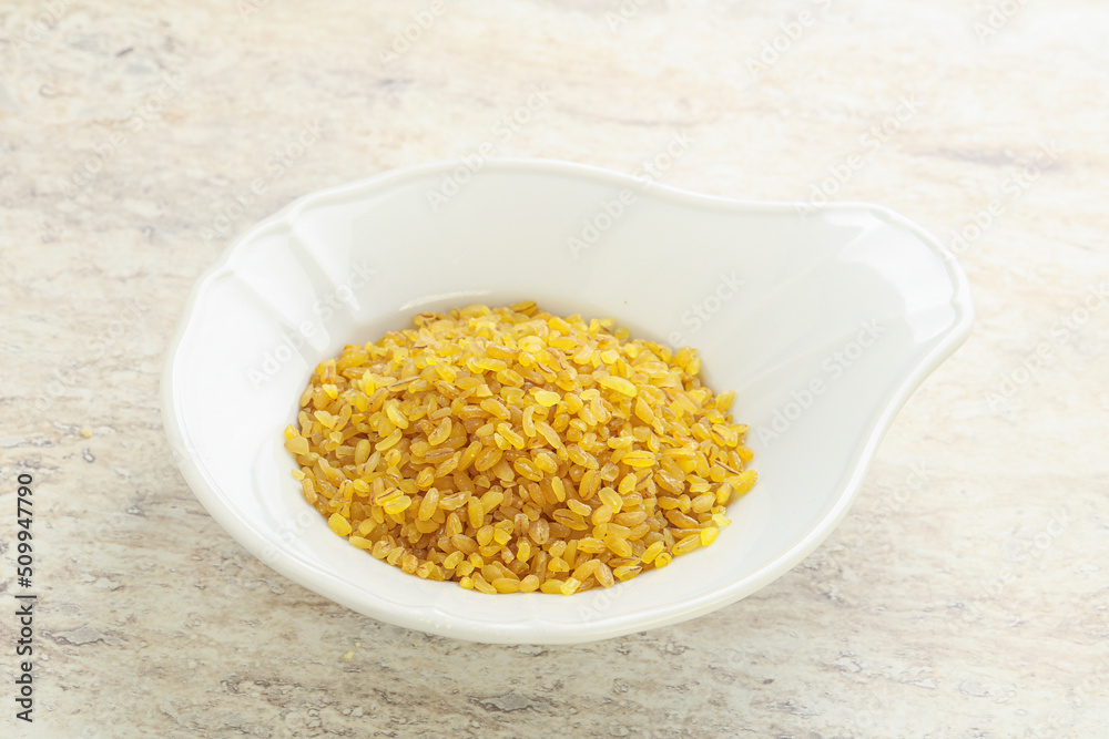 Raw bulgur in the bowl Raw bulgur in the bowl