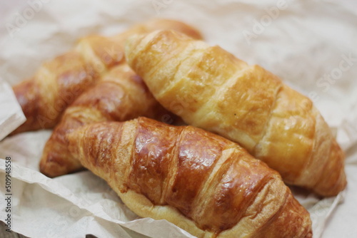 Delicious fresh croissants arranged on a plate © Birch Photography