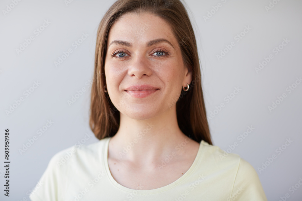 Smiling woman close up face portrait. Girl looking away. Female head shot with shallow depth of field. Smiling woman close up face portrait. Girl looking away. Female head shot with shallow depth of field.