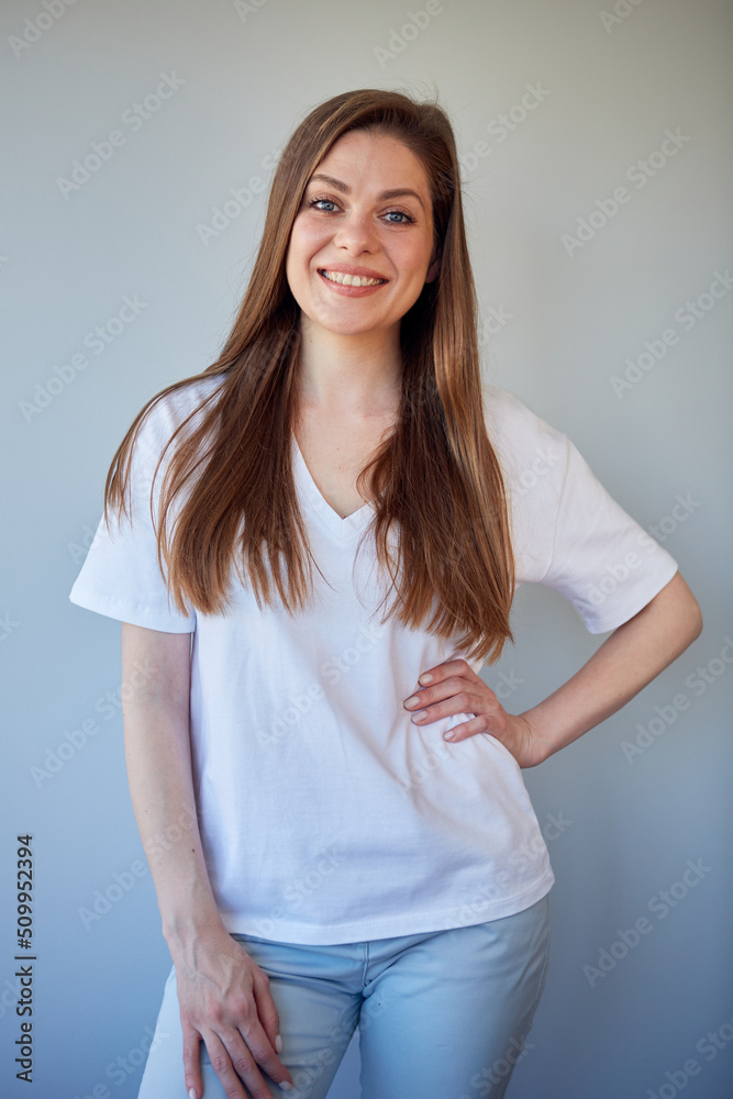 Smiling woman in white shirt. Happy girl with long hair. Smiling woman in white shirt. Happy girl with long hair.