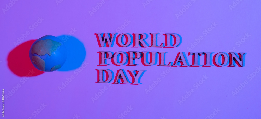World population day write by wooden letter with globe in neon light