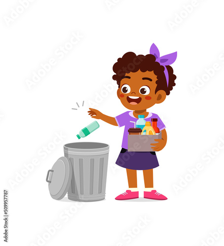 little kid throw trash to trash bin