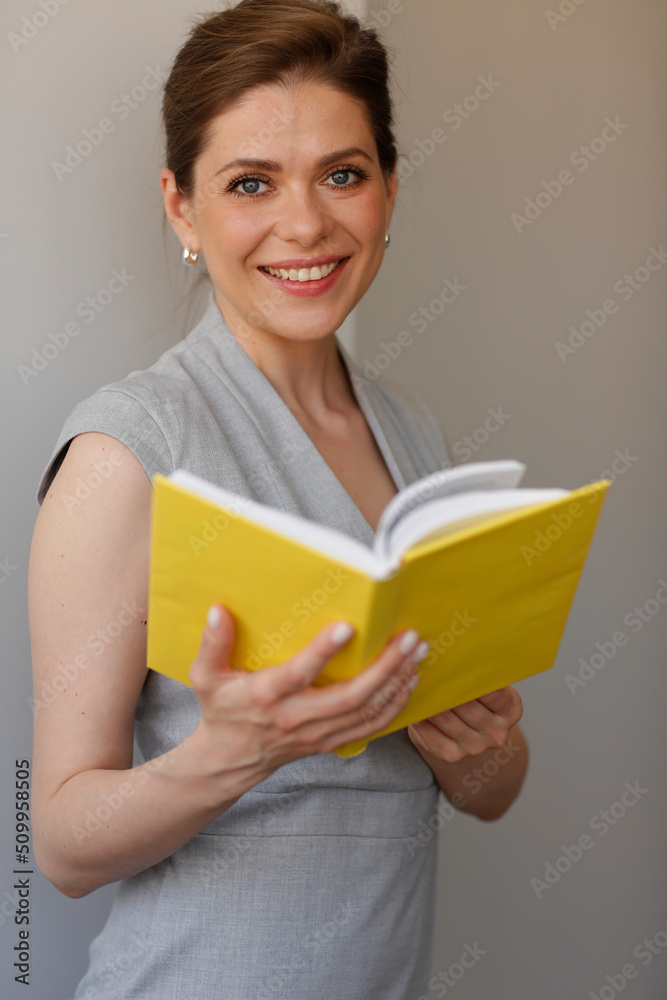 Teacher woman holding open book, or student girl with work book. Teacher woman holding open book, or student girl with work book.