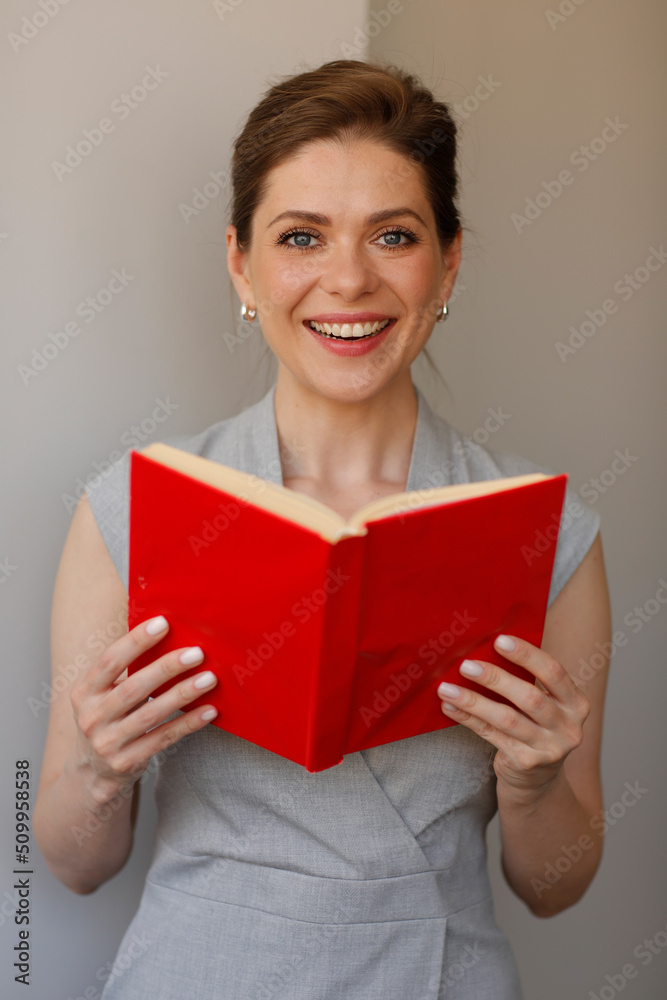 Happy woman teacher holding red open book. Teacher profession portrait. Happy woman teacher holding red open book. Teacher profession portrait.