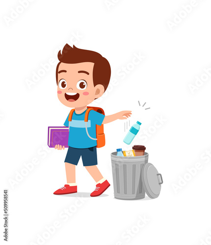 little kid throw trash to trash bin