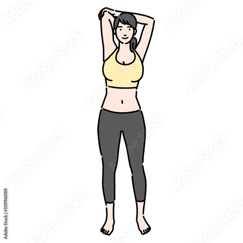 腕のストレッチをする若い女性
