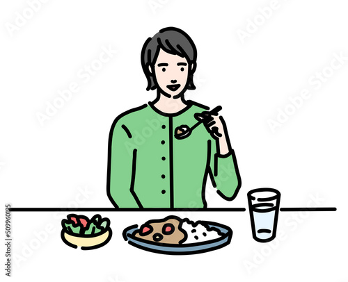 健康的な食事を摂る若い女性
