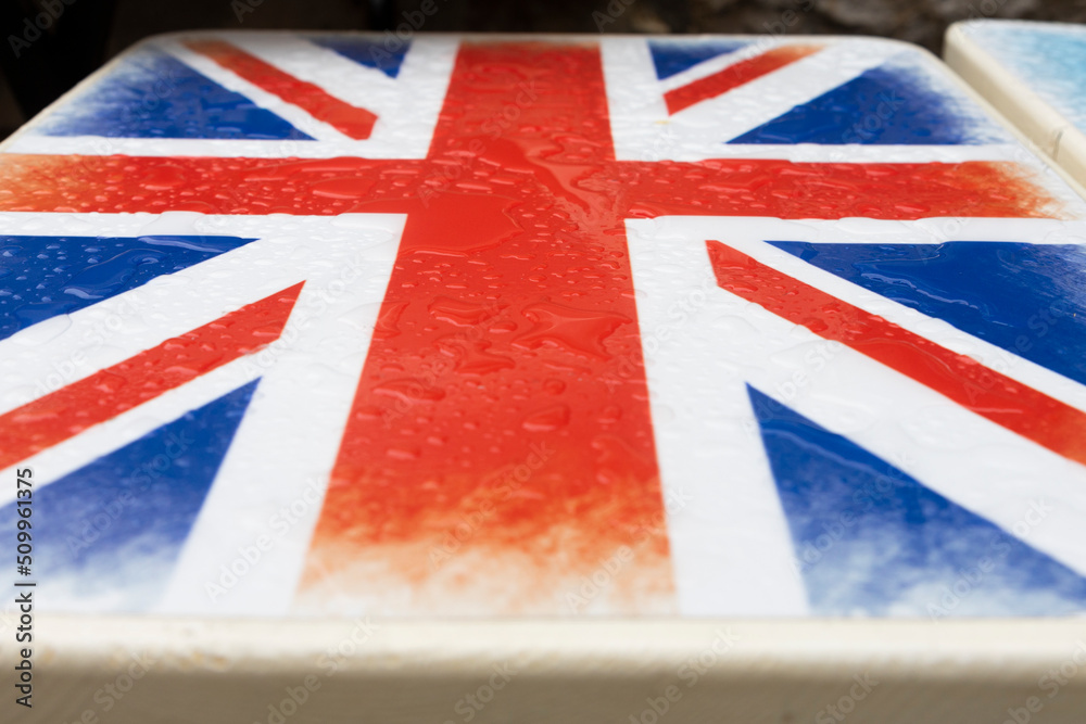 Fototapeta premium United Kingdom Flag (Union Jack) on the tables surface