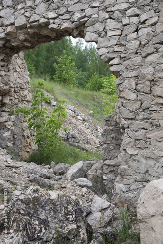 passage in a stone wall made of light stone