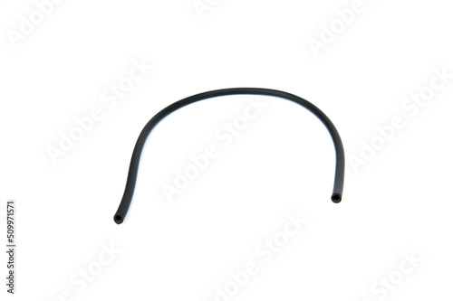 Black rubber fuel hose isolated on white background.