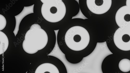 Abstract monochrome continuously moving pattern of simple geometric shapes. Looped animation. Digital background