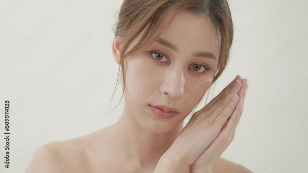 Young asian woman with beauty concept. Portrait of young beautiful lady posing at white background. Young asian woman with beauty concept. Portrait of young beautiful lady posing at white background.
