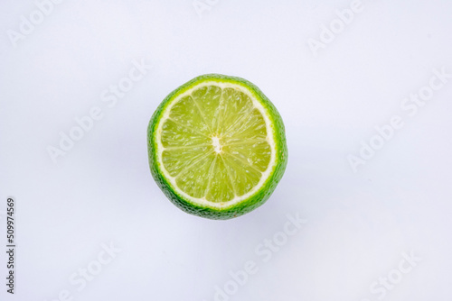 half lime isolated on white background close up 