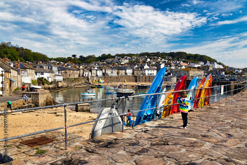 Mousehole harbour in Cornwall, England photo