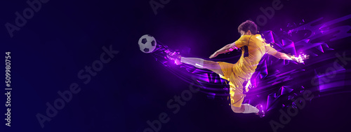Flyer. Creative artwork with soccer, football player in motion and action with ball isolated on dark background with polygonal and fluid neon elements. Art, creativity, sport
