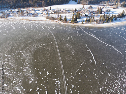 Aerial view of Lac de Joux, a frozen lake in wintertime near Le Sentier, Switzerland. photo