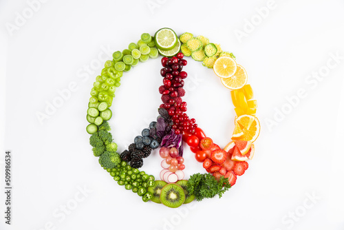 peace sign made of fruits, on a colorful white background