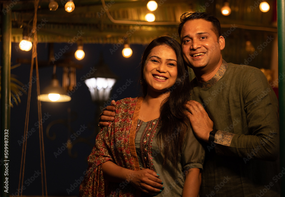 Portrait of young Indian couple in ethnic wear 