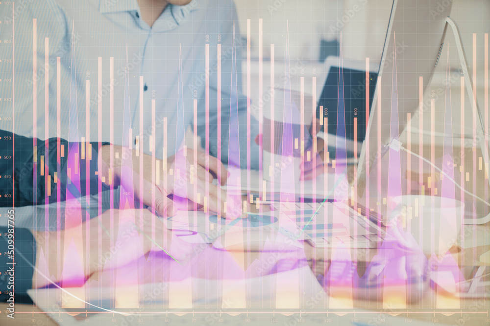 Multi exposure of chart with man typing on computer in office on background. Concept of hard work. Multi exposure of chart with man typing on computer in office on background. Concept of hard work.