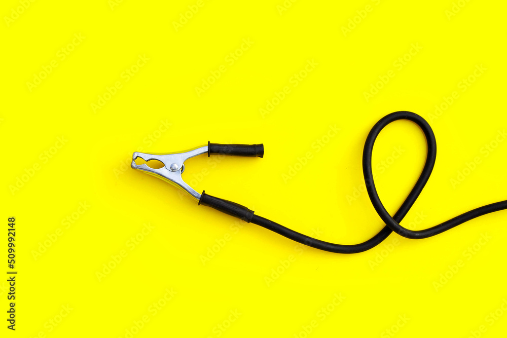 Welding ground clamp on yellow background. Welding ground clamp on yellow background.