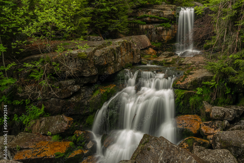 Waterfall of Jedlova creek in Jizerske mountains in spring morning