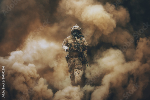 Swat forces with gas mask between smoke and gas in battle field	 photo
