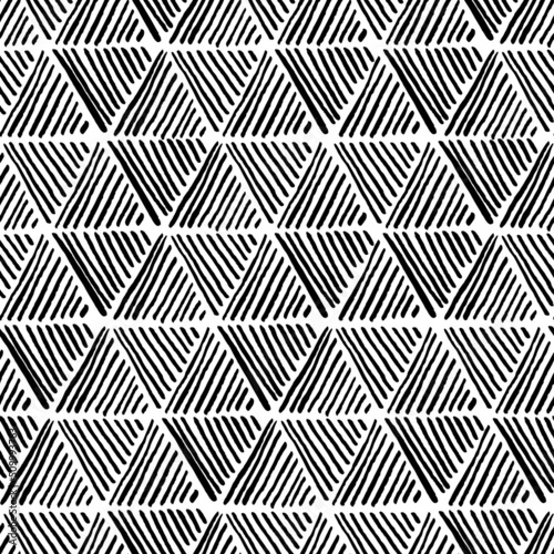 Seamless hand drawn pattern with striped triangles