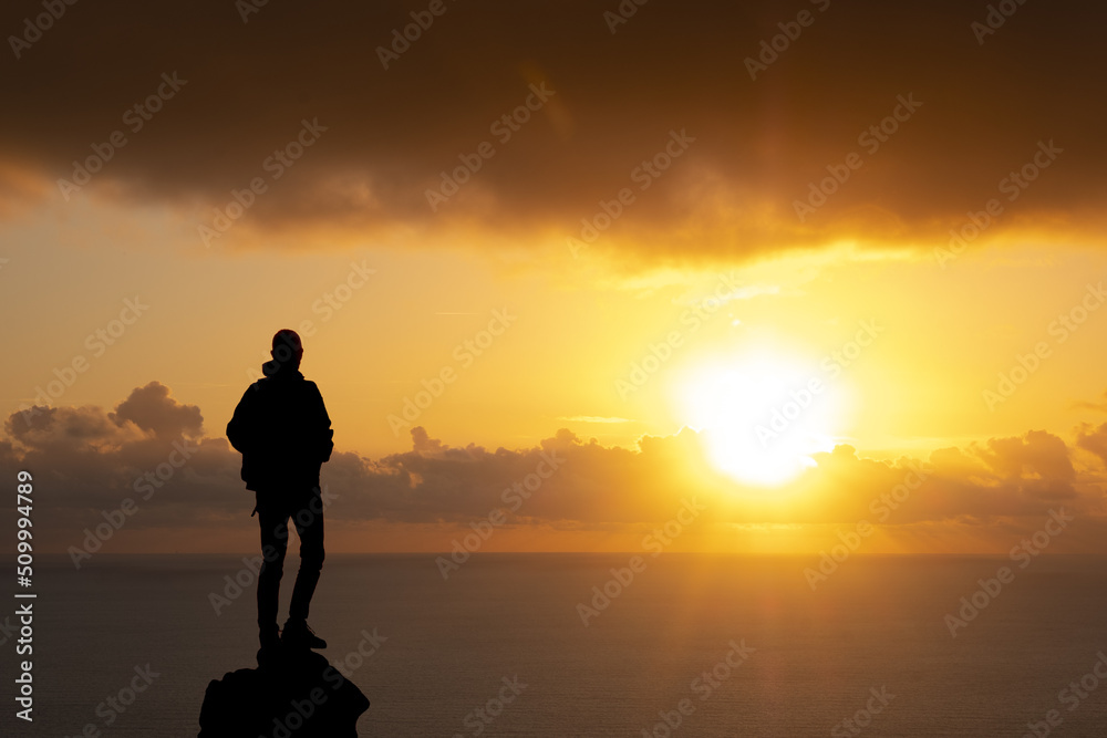Man and sunset sun over the sea, Euskadi