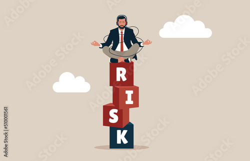 Entrepreneur investor calmly meditate on stack with the word RISK. Risk management, control or assess to lose money in investing, process or preparation for safety,  secure earning and loss.