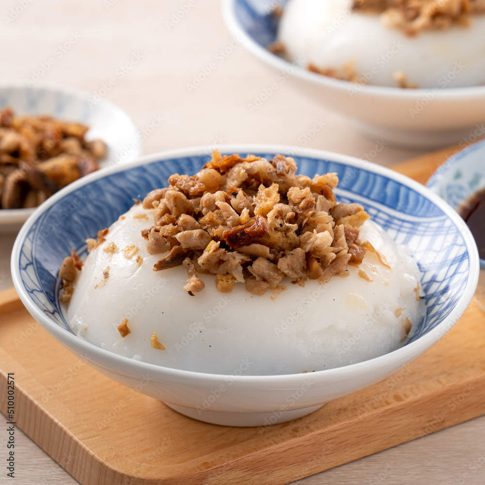 Taiwanese savory rice pudding Wa gui with chopped dried radish and soy sauce Taiwanese savory rice pudding Wa gui with chopped dried radish and soy sauce