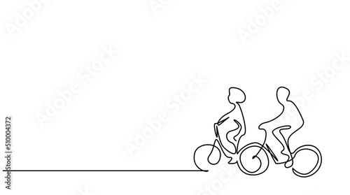 man and woman couple cycling outside