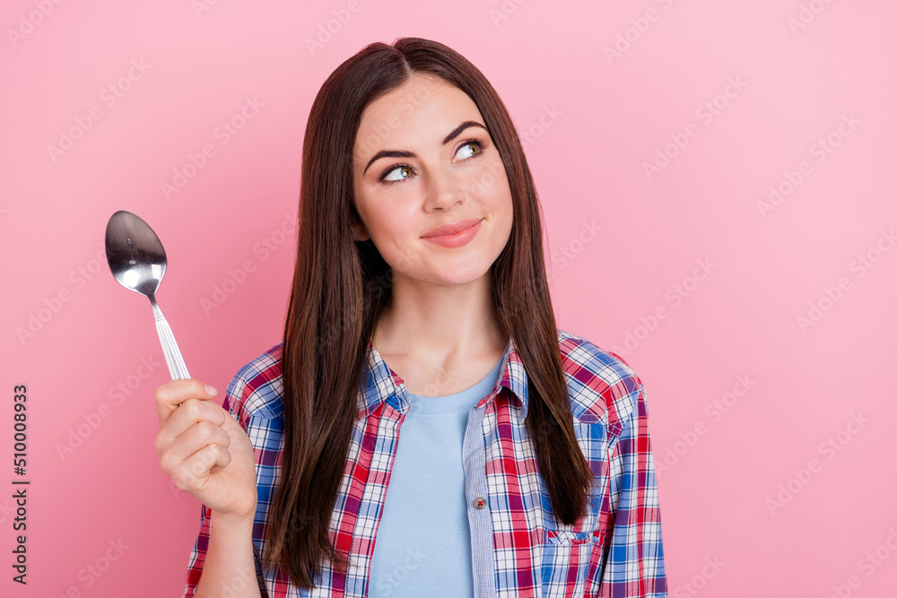 Portrait of young adorable girl look blank space dreaming about yummy dessert isolated on pink color background Portrait of young adorable girl look blank space dreaming about yummy dessert isolated on pink color background