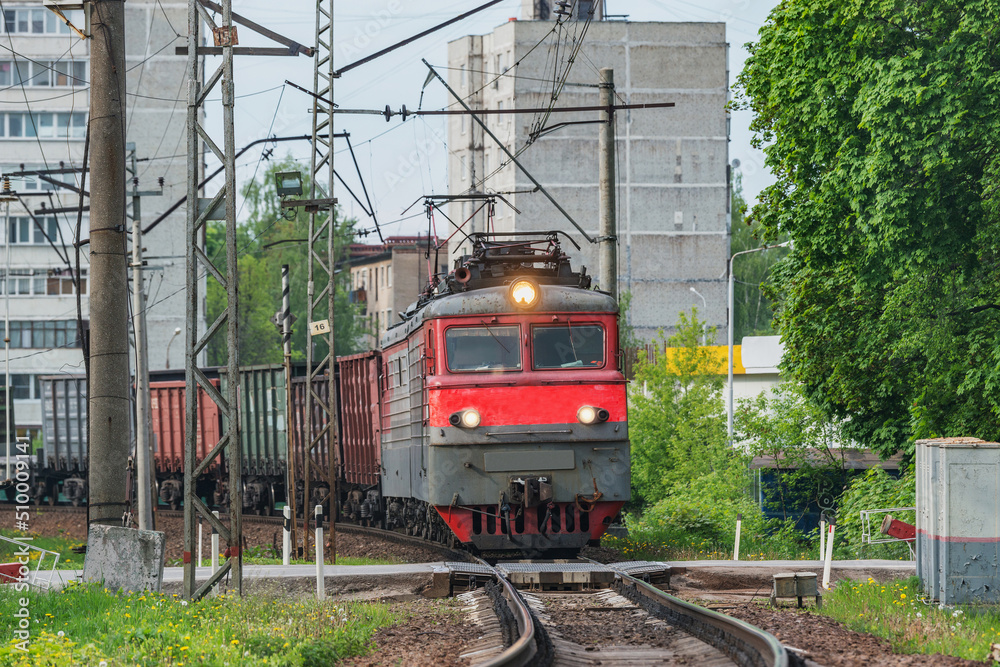 Naklejka premium Freight train arrives to the station.