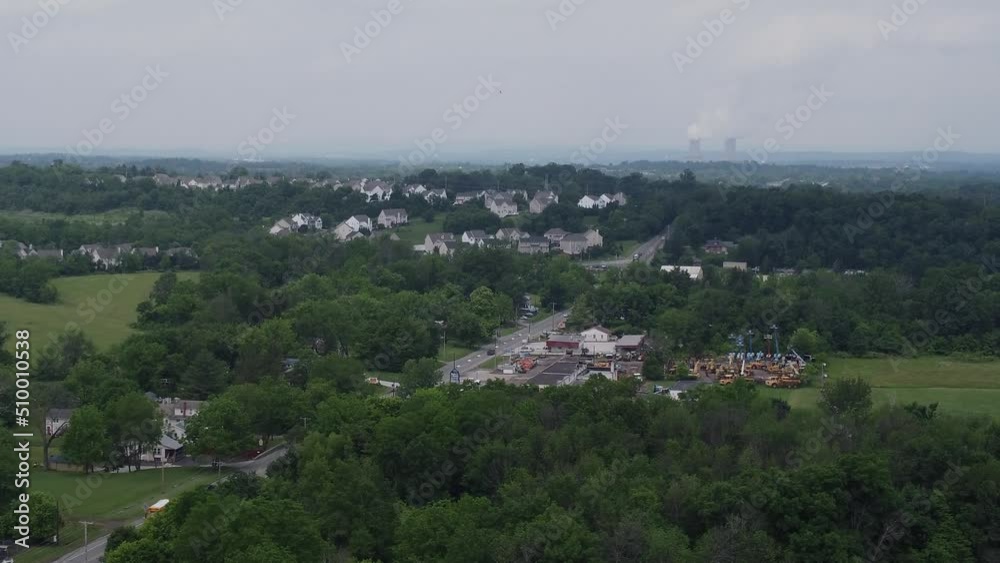 Aerial view small town neighborhood trees time-lapse Aerial view small town neighborhood trees time-lapse
